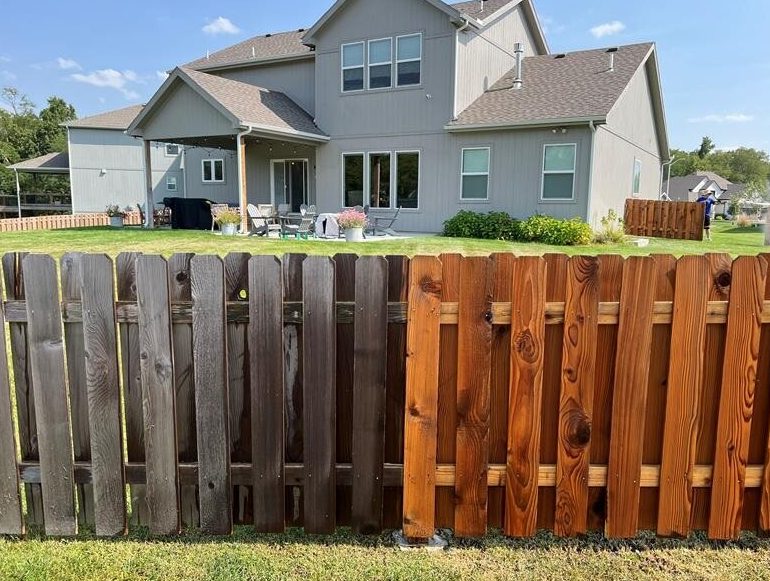 Wood fence restoration in progress